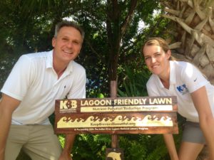 Homeowner Bill Deluccia and program coordinator Allison Arteaga with Bill's newly awarded lawn sign.